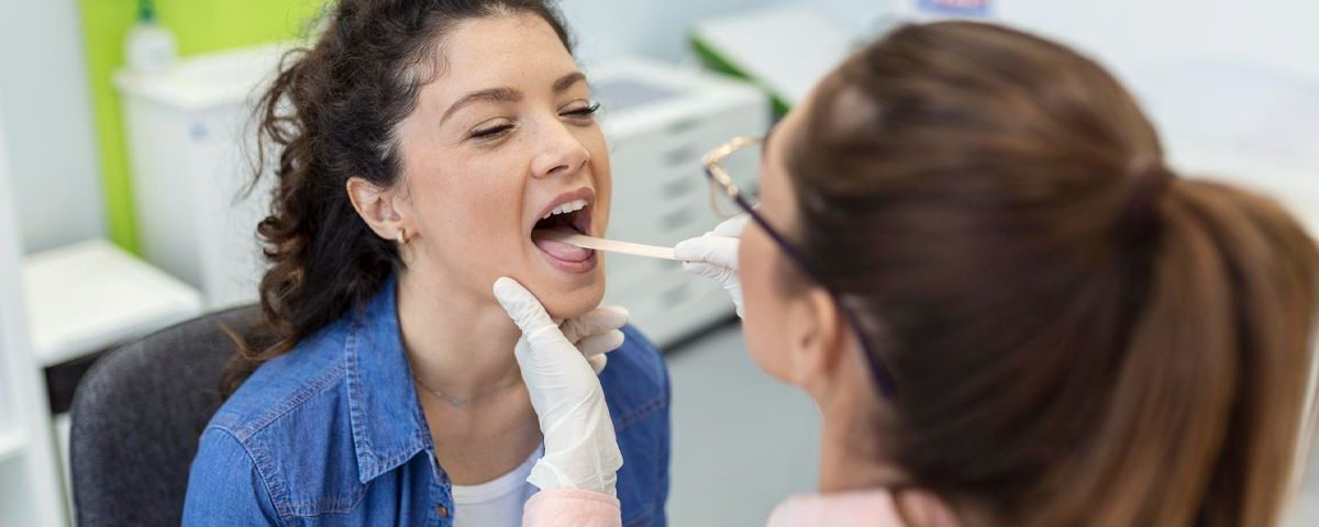 What are the Signs of Infection after Oral Biopsy?