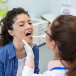 What are the Signs of Infection after Oral Biopsy?