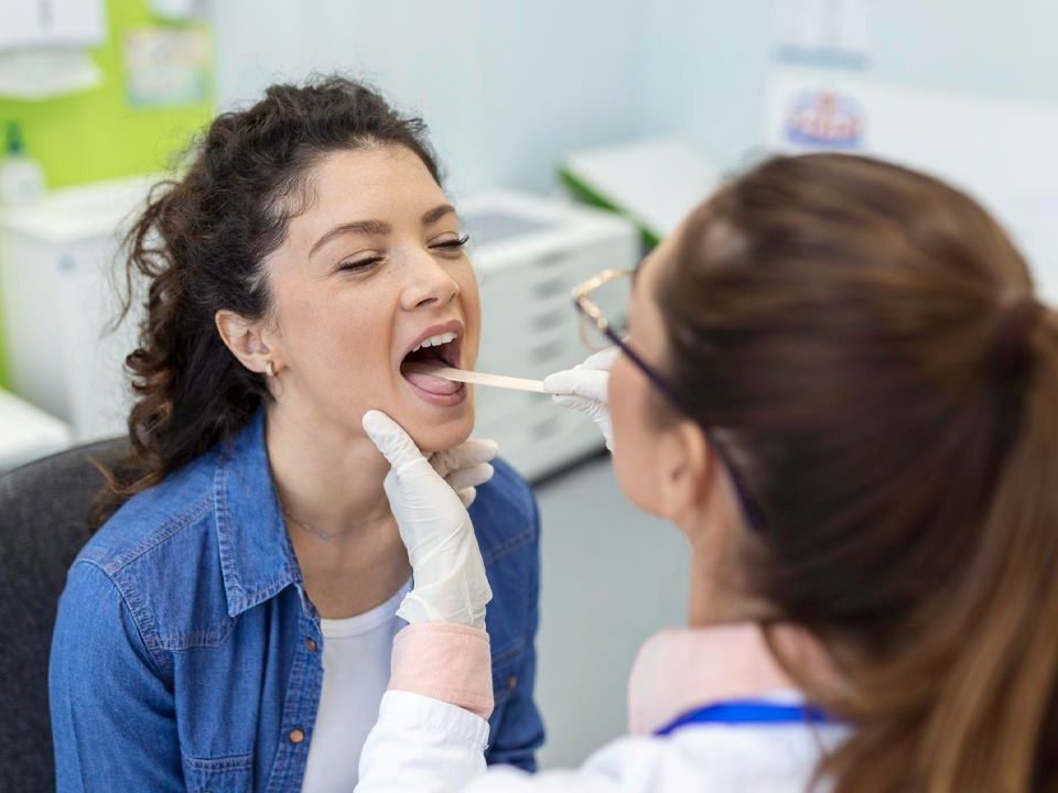 What are the Signs of Infection after Oral Biopsy?