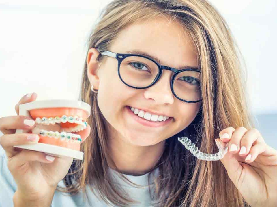 Invisalign vs Braces for Adults